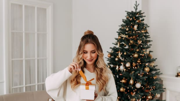 Woman opening gift